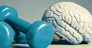an image of a brain and two dumbbells