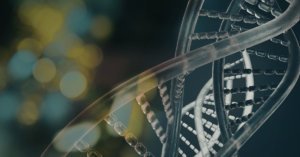 A detailed 3D rendering of a DNA double helix with a blurred background of bokeh lights in yellow and blue.
