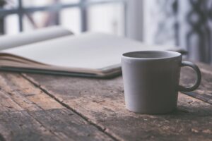 journal and coffee
