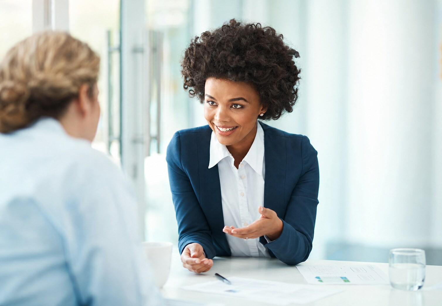 Clinician discussing brain-based treatment types with a patient