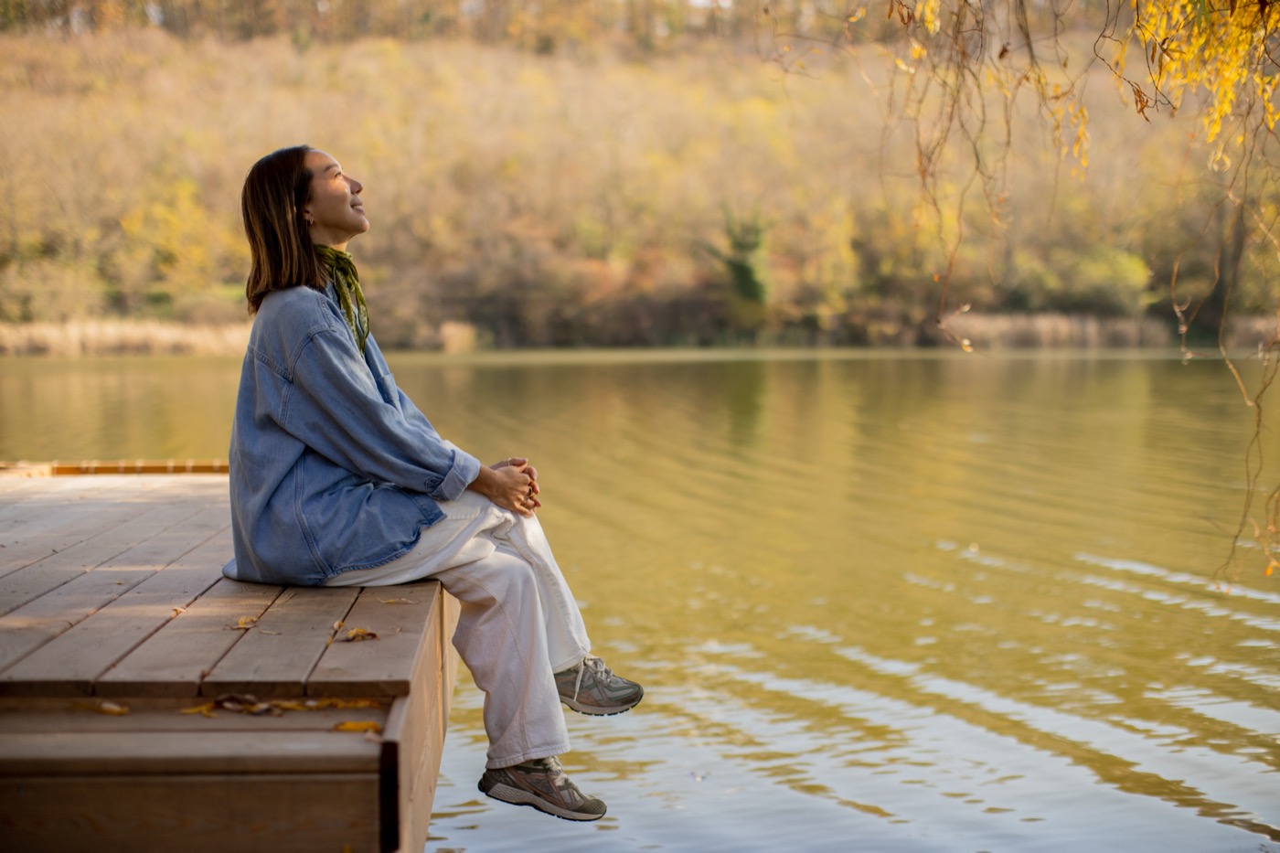Patient reflecting outdoors by the water