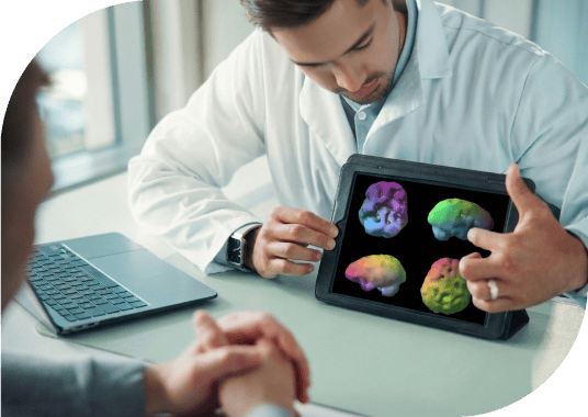 Physician showing a patient brain scan results on a tablet