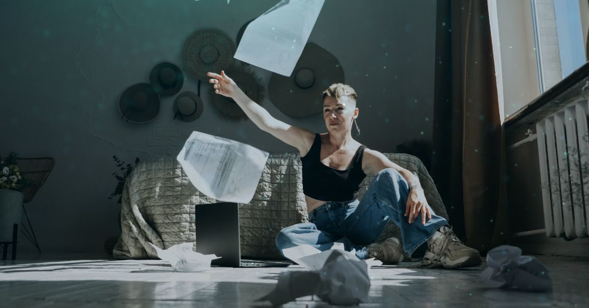 woman throwing paper