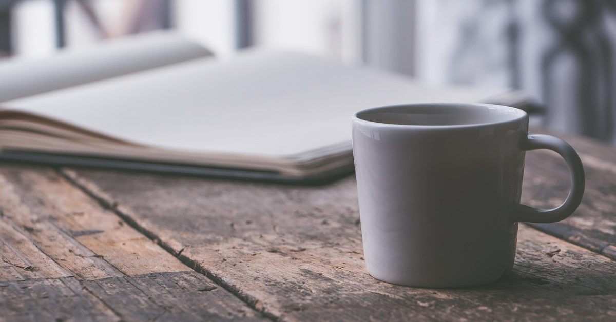 journal and coffee