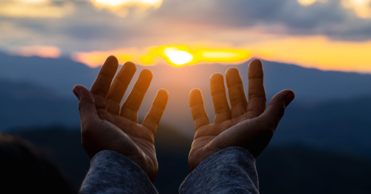 Close up christians hands pray to God with spiritual faith on holy bible in catholic church religion worship prayer ask god bless pray grace jesus believe Christianity religion prayer holy worship.